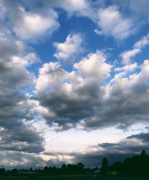 blue sky with backlit clouds