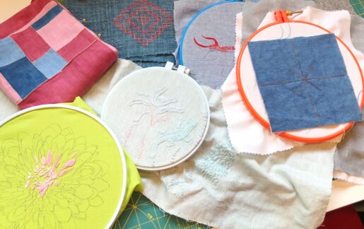 An assortment of embroidery projects in progress